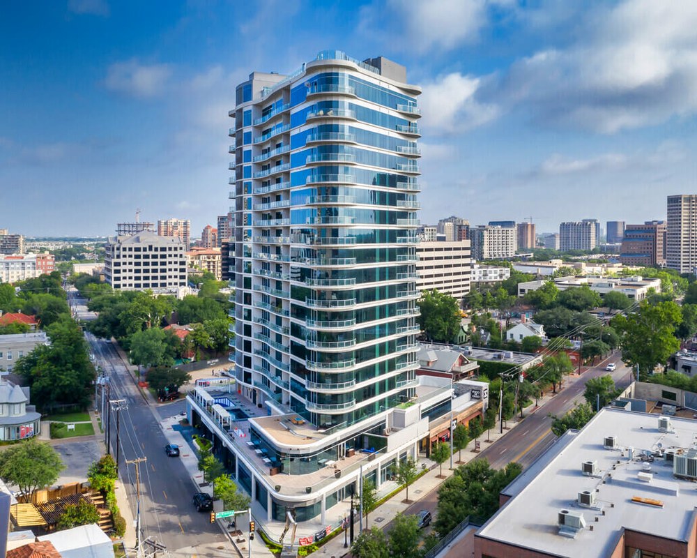 A residential tower above the city — one predictive view of every asset